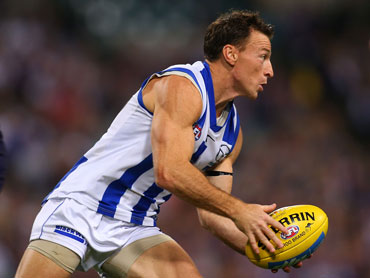 Brent Harvey gave Ryan Crowley the run-around. Photo: Getty