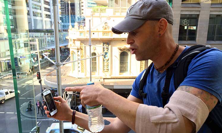 Lowy with an arm bandage for shrapnel wound.