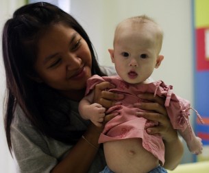 Gammy with his surrogate mother.