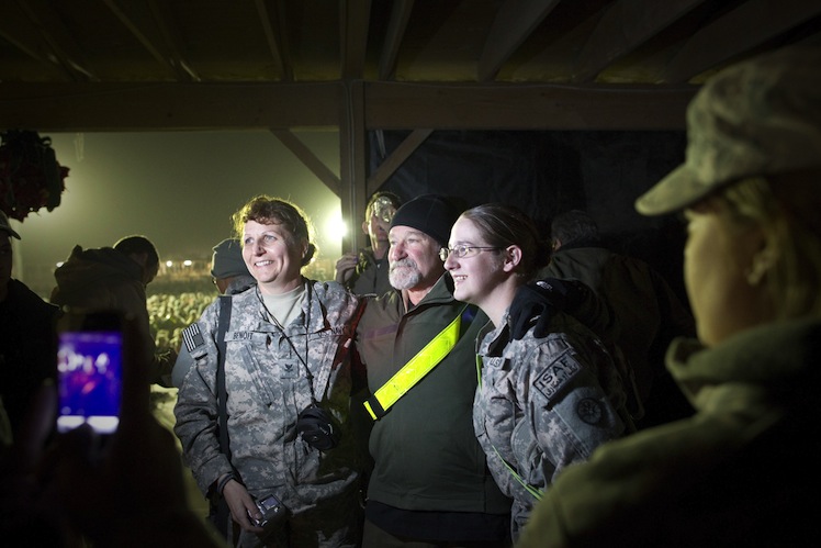 Williams visiting with US troops in 2010.