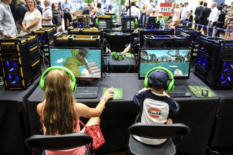 Children play in an online Minecraft competition. Source: AAP.