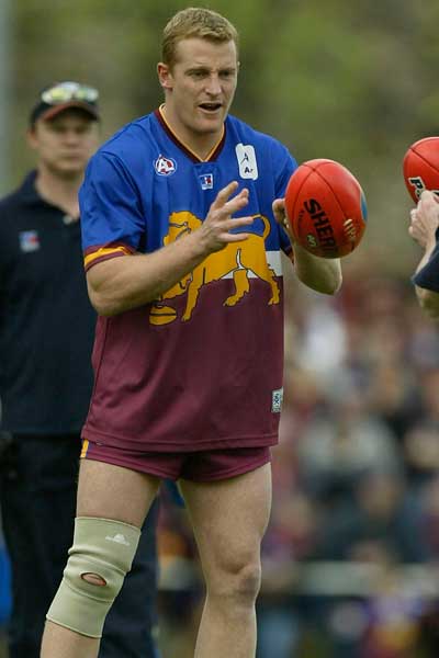 Michael Voss' knee was sore heading into the 2003 grand final, but he came out a triple premiership captain. Photo: Getty