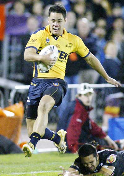 Twinkle toes: Jarryd Hayne at with the world (and Patrick Ah Van) at his feet. Photo: AAP