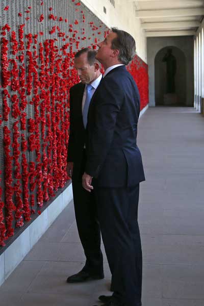 David Cameron and Tony Abbott take in the Roll of Honour at the Australian War Memorial. Photo: AAP