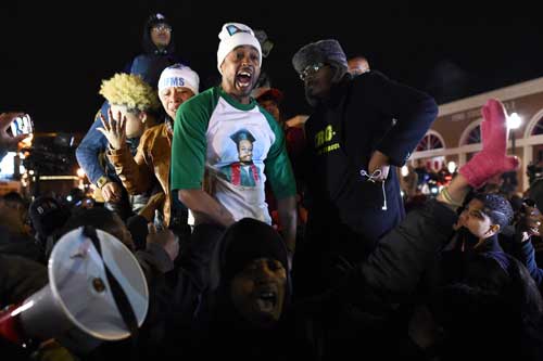 Demonstrators react angrily to the news officer Wilson had been cleared. Photo: Getty