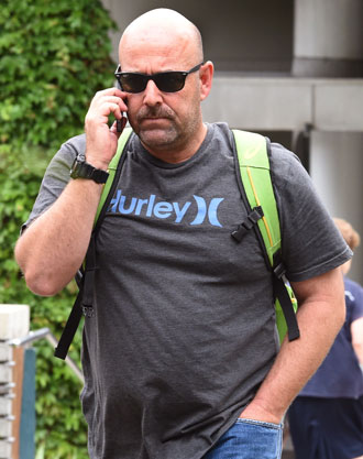 Australian coach Darren Lehmann after saying his farewells to Phillip Hughes. Photo: Getty