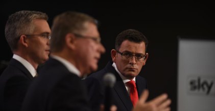 Opposition leader Daniel Andrews listens to Victorian premier Denis Napthine during a debate