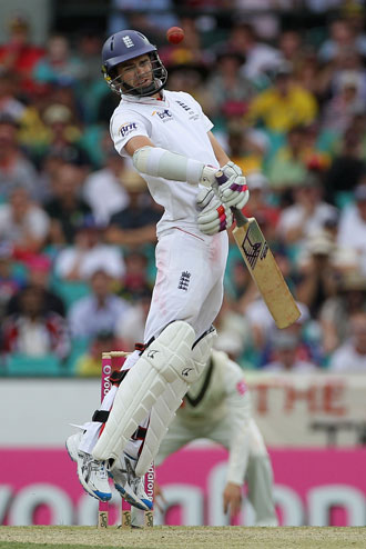 MItchell Johnson fizzes a ball past England tail-ender James Anderson last summer. Photo: Getty 