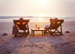 Retirment beach chairs sunset