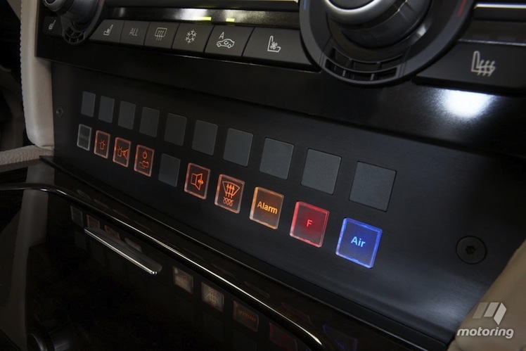 The car's dashboard features special emergency controls.