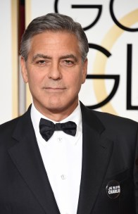 Actor George Clooney wears a "Je suis Charlie" button.