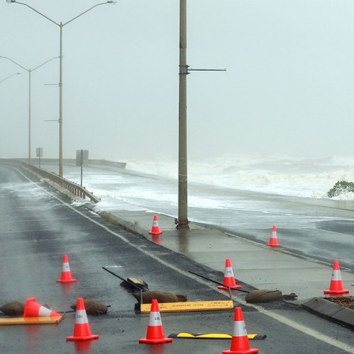 Surfer made the most of the whipped-up swell. Photo: AAP