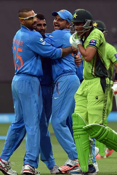 India celebrates the big early wicket of Younis Khan. Photo: Getty