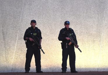 Australian Federal Police officers outside Parliament House in Canberra