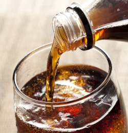 Soft drink pour shutterstock
