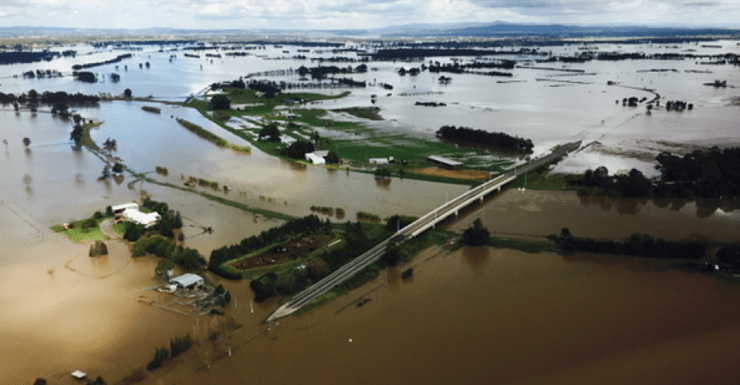 An aerial photograph of the Hunter Valley shows the storm damage.