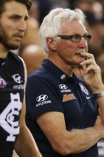 Malthouse and Dale Thomas survey the carnage against GWS. Photo: Getty
