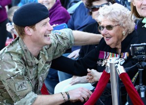 Prince Harry with Daphne Dunne (wearing her husband's Victoria Cross).