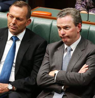 Minister for Education and Training Christopher Pyne reacts to Mr Shorten's budget reply speech.