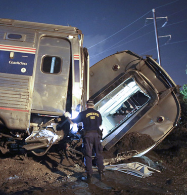 Emergency personnel work the scene of a deadly train wreck in Philadelphia.