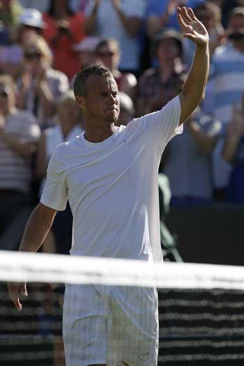 One final wave goodbye to Wimbledon. Photo: Getty