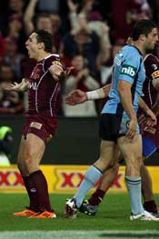 Slater celebrates an Origin try in 2011. Photo: Getty