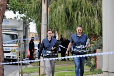 Police outside Walsh's Adelaide home. Photo: Getty