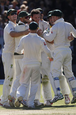 Australia celebrates another wicket. Photo: AAP