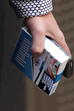 Would you give cigarettes to a child? Photo: AAP
