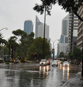 Rain inundates St Georges Terrace in Perth earlier this year.