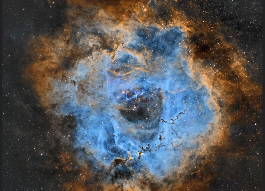 Measuring 50 light years in diameter, the large, round Rosette Nebula is found on the edge of a molecular cloud in the constellation of Monoceros the Unicorn.