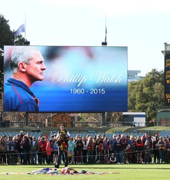 AFL fans and supporters attend the Phil Walsh memorial at Adelaide Oval.