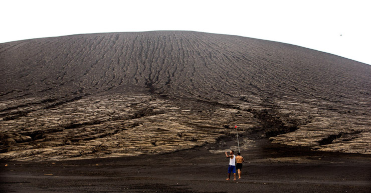 TONGA - JULY 10:  (AUSTRALIA & NEW ZEALAND OUT) No more than ten people have explored the newest island on Earth, July 10, 2015. It emerged from the waters of the South Pacific in January 2015 when a volcano erupted on the nearby island of Tonga, forcing pulverised magma into the air above the ocean. The magma gradually built up on the ocean floor, penetrating the surface of the water to form the island. (Photo by Edwina Pickles/The Sydney Morning Herald/Fairfax Media via Getty Images)