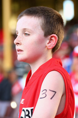 A young fan with Goodes' number written on his arm. Photo: Getty