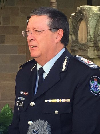 Queensland Police Minister Jo-Ann Miller (right) and Queensland police commissioner Ian Stewart speak to the media at state parliament in Brisbane, Tuesday, Aug. 11, 2015. Stewart has been granted a two-year contract extension, which has been lambasted by the Queensland Police Union. (AAP Image/Alexandra Patrikios) NO ARCHIVING
