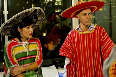 Celia Pacquola (Nat) and Rob Sitch (Tony), are often made to endure the bizarre behaviour of their colleagues. Photo: Supplied.