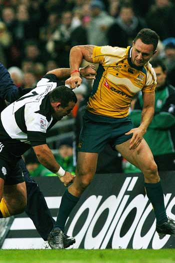 Cooper and Federico Pucciariello fight during the Wallabies clash with the Barbarians in 2008. Photo: Getty