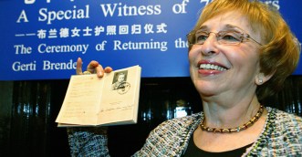 Gerti Brender with the passport she used to gain entry to Shanghai. She later settled in Australia. Photo: Getty.