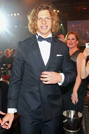 Nat Fyfe walks to the stage - sans cane. Photo: Getty