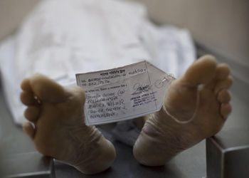 Cesare Travelle's body lies in a morgue. Photo: Getty