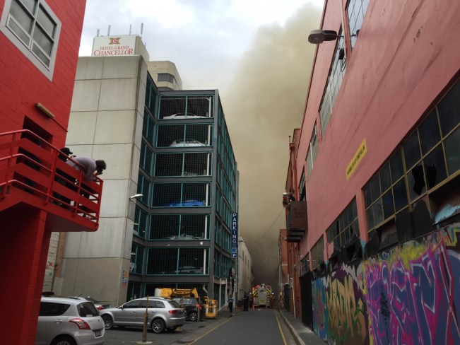 Buildings in Hindley Street have been evacuated as fire crews battle the blaze.