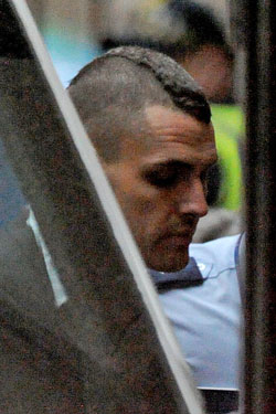 Sean Price is led into the Supreme Court in August.