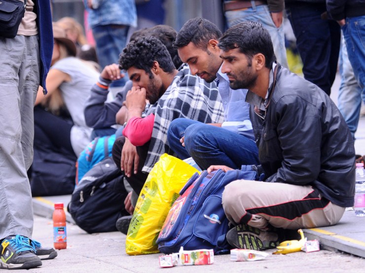 Migrants wait at the transit zone of Eastern (Keleti) railway main station in Budapest.
