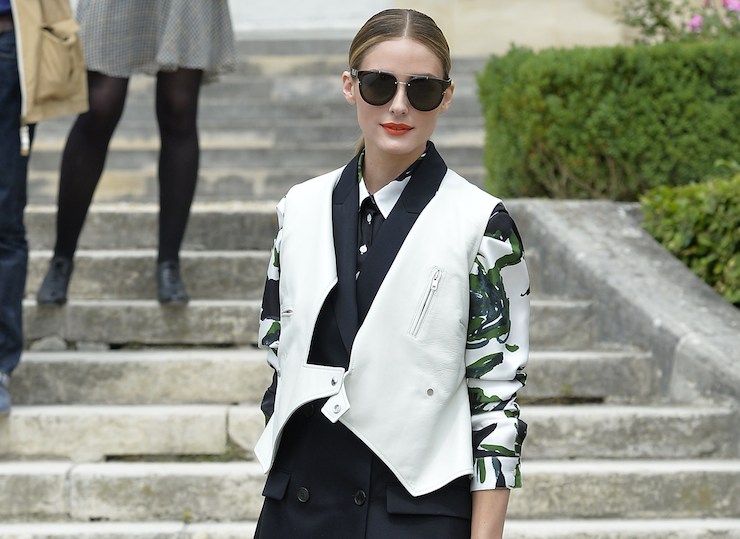 Olivia Palermo wears a black-and-white gilet.
