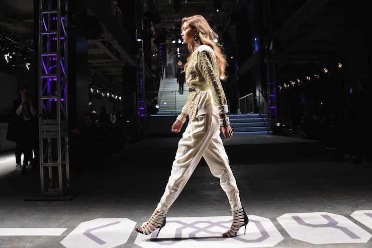 Gigi Hadid rocks a pant on the catwalk.