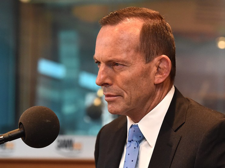 Former Prime Minister Tony Abbott speaks to Neil Mitchell at the 3AW studio in Melbourne, Thursday, Oct. 1, 2015. Abbott refused to say if he has forgiven Malcolm Turnbull for taking his job. (AAP Image/Julian Smith) NO ARCHIVING