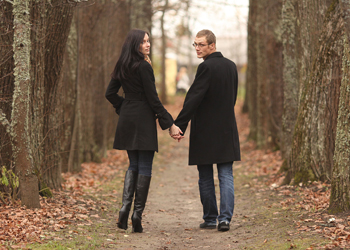 adult couple holding hands