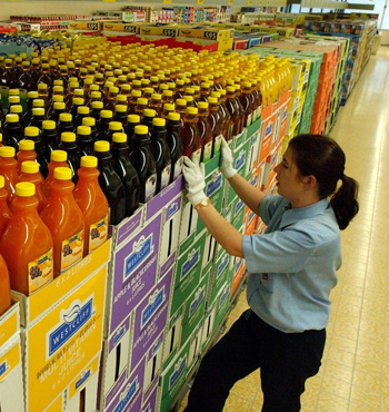 Aldi is able to keep its overheads low by using shelf-ready packaging which can be wheeled into place rather than being unpacked by hand.