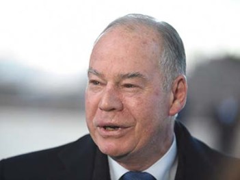 Federal Liberal MP Russell Broadbent arrives through the House of Representatives doors at Parliament House in Canberra, Monday, Aug. 10, 2015. The Parliament will choose a new Speaker on Monday to replace Bronwyn Bishop following her resignation over the travel expenses scandals. (AAP Image/Mick Tsikas) NO ARCHIVING