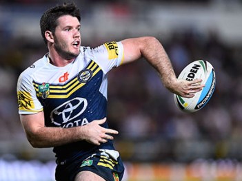 TOWNSVILLE, AUSTRALIA - JUNE 27: Lachlan Coote of the Cowboys passes the ball during the round 16 NRL match between the North Queensland Cowboys and the Cronulla Sharks at 1300SMILES Stadium on June 27, 2015 in Townsville, Australia. (Photo by Ian Hitchcock/Getty Images)